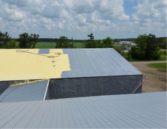 Agricultural storage building metal roof waterproofed